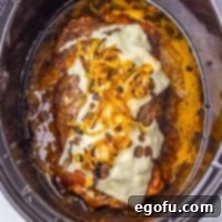 fully cooked French onion meatloaf in a crock pot.