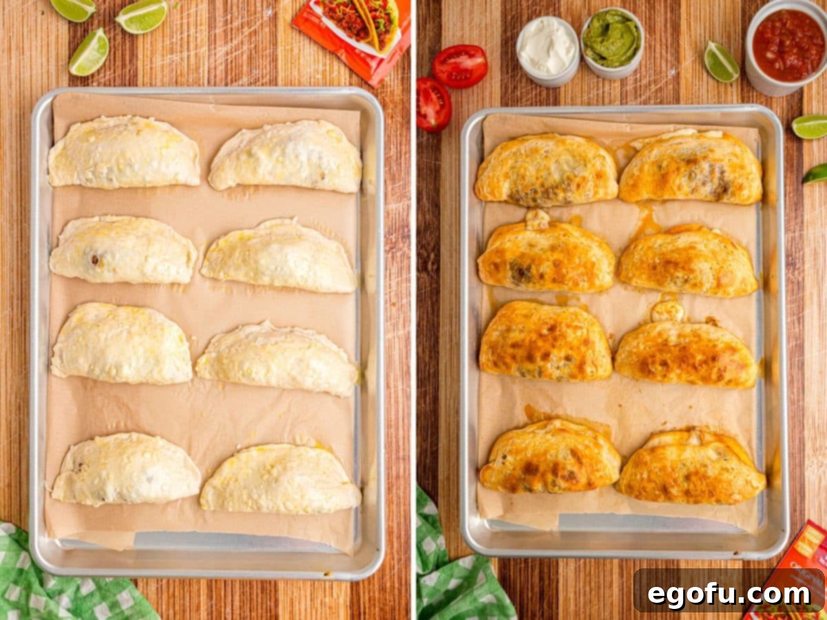 Freshly baked Taco Pockets arranged on a sheet pan, golden brown and ready to serve.