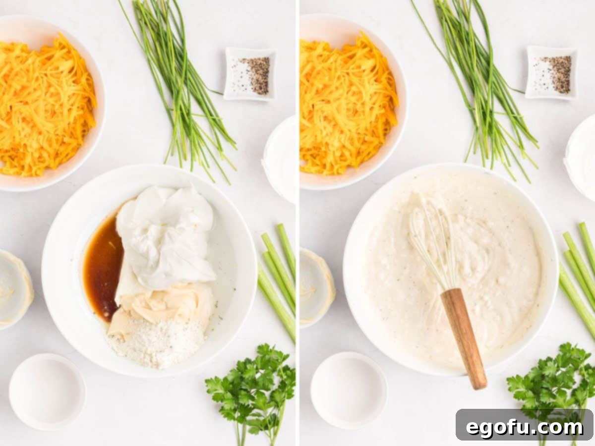 A bowl with sour cream, mayonnaise, cream cheese, water, ranch seasoning, and Worcestershire sauce being mixed together.