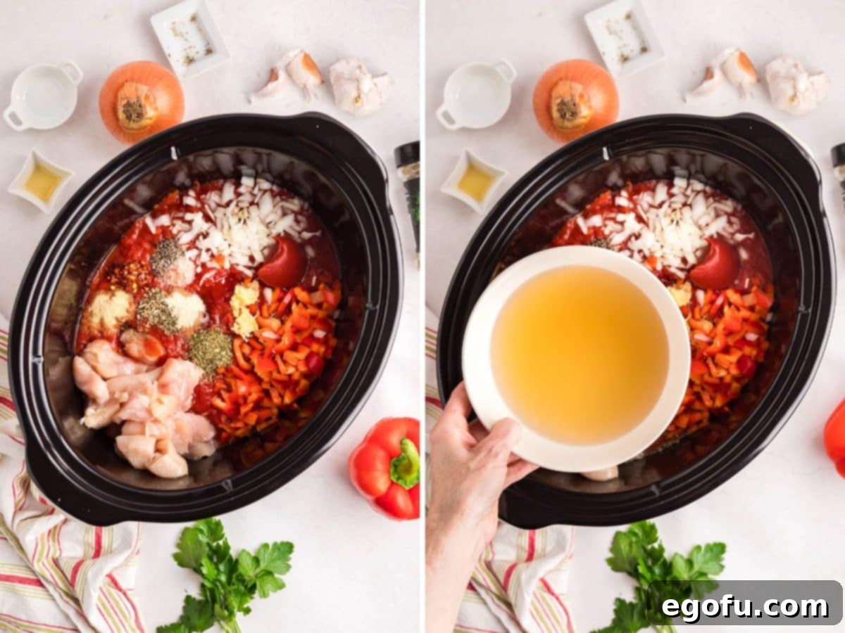 Almost all ingredients for a Chicken Parm soup are placed into a Slow Cooker, with chicken broth being poured in to combine everything.