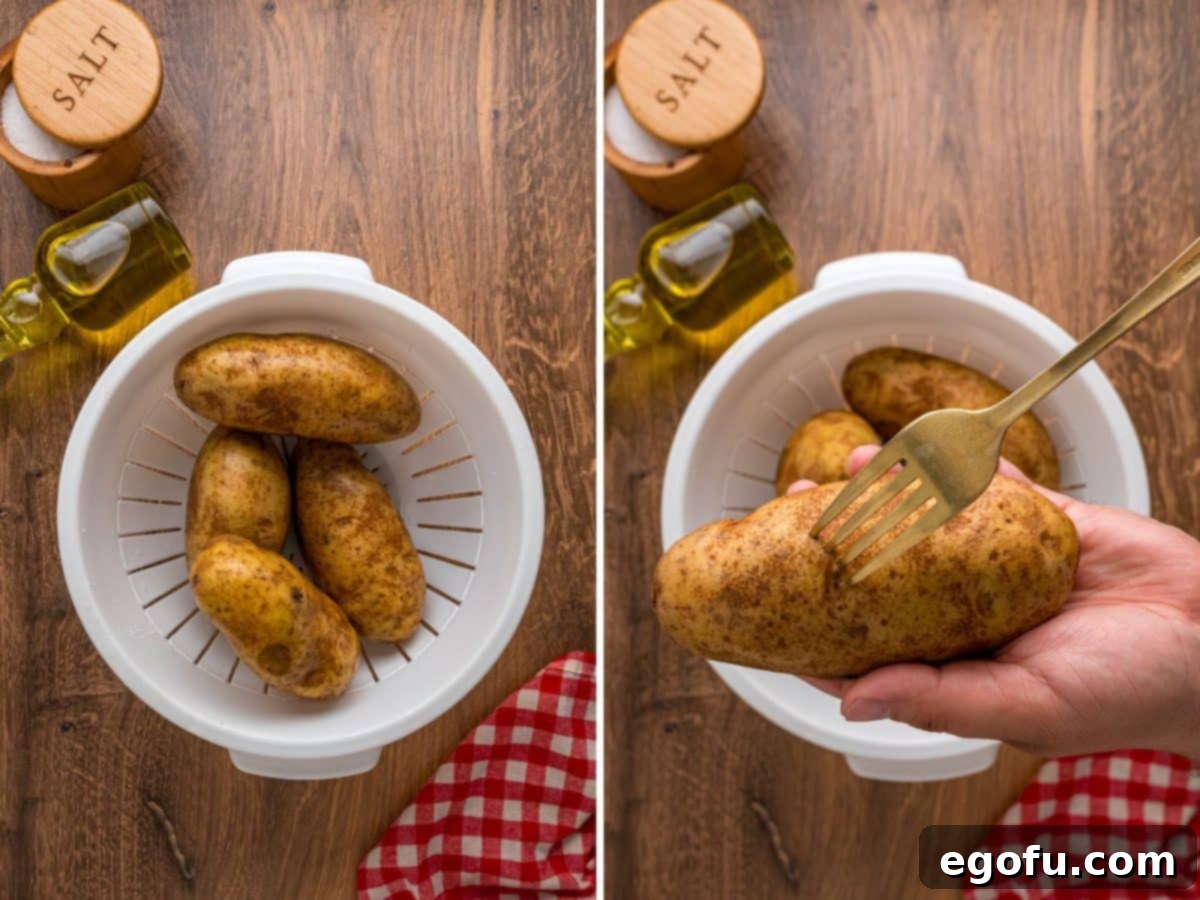 A colander with cleaned potatoes and a fork poking holes in a potato to prepare for baking.