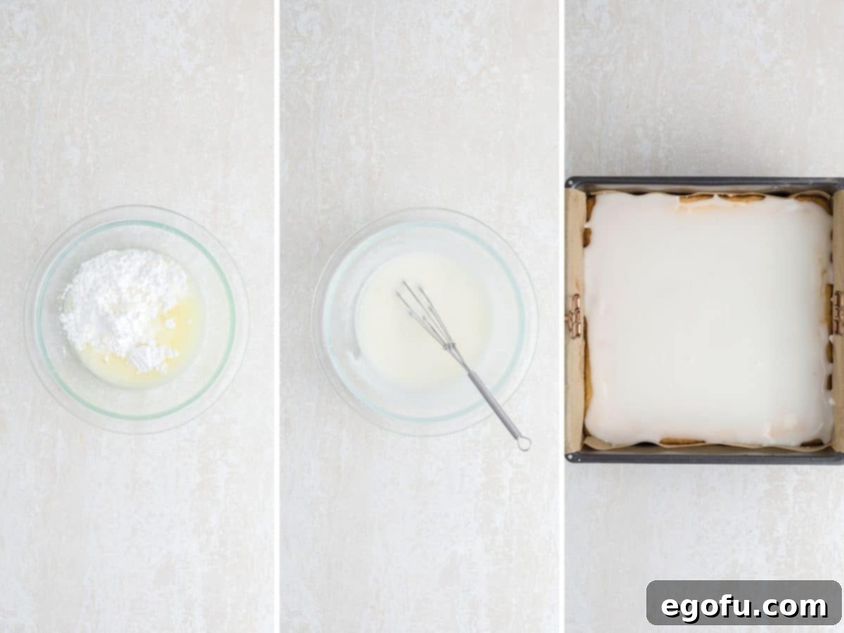 Lemon juice and powdered sugar being mixed together to create a smooth glaze, which is then spread evenly over a pan of homemade lemon brownies.
