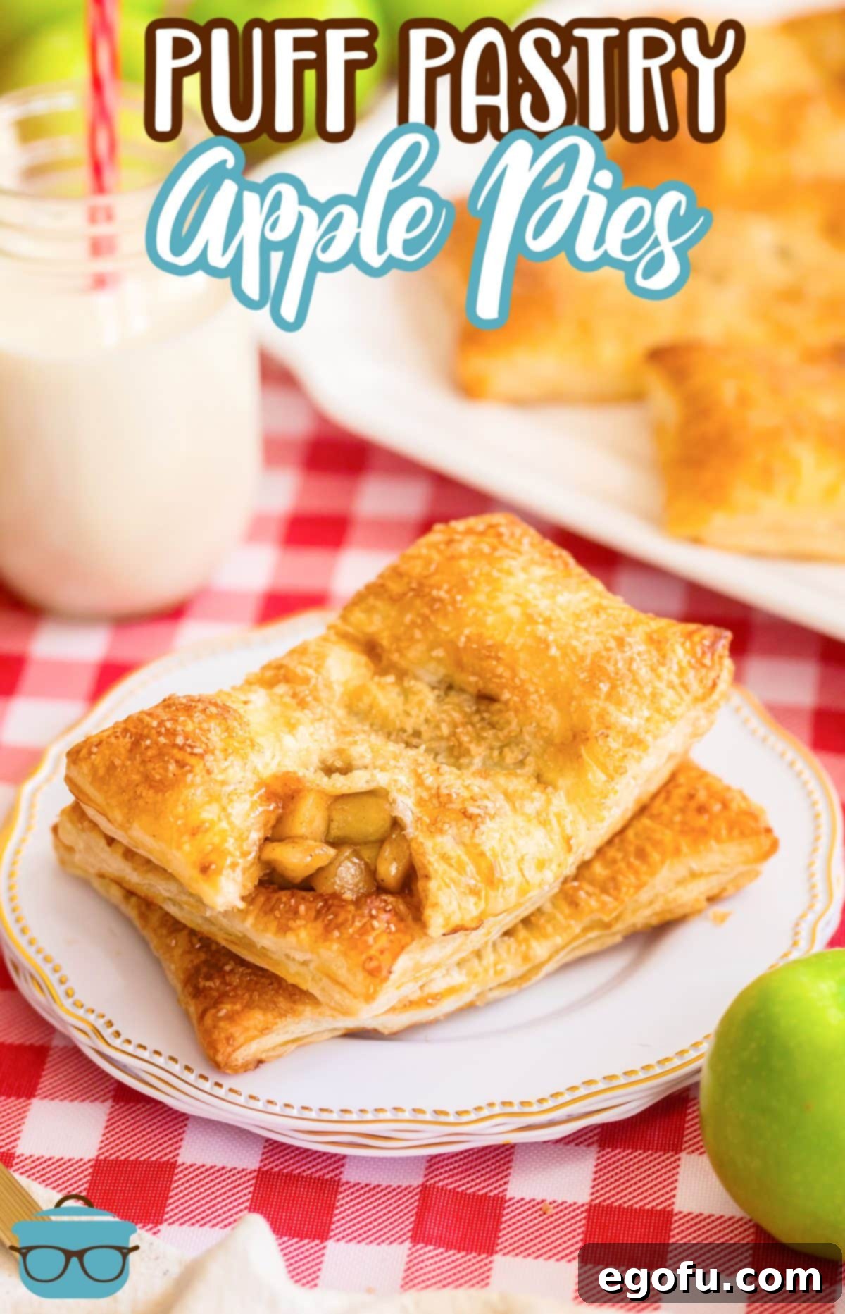A small pile of freshly baked Puff Pastry Apple Pies on elegant dessert plates.