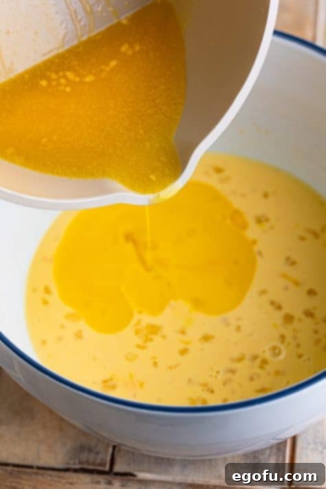 Butter being added to the mixture.