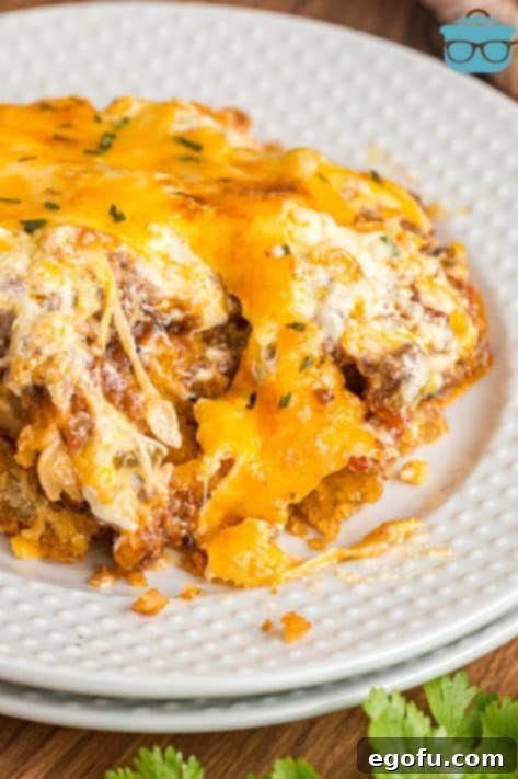 A plate with a huge serving of Cattle Drive Casserole.