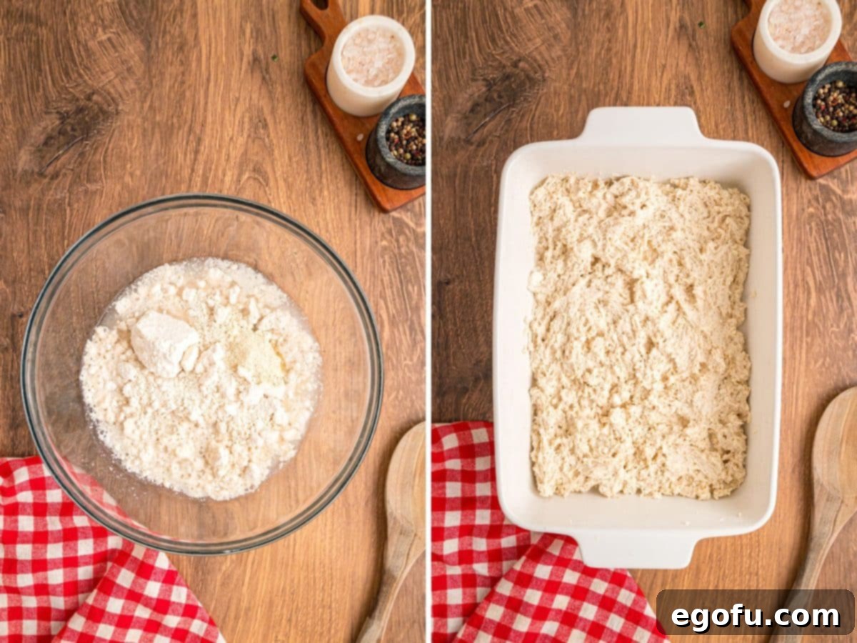 A bowl of biscuit mix ingredients next to the prepared dough spread out in a baking dish, ready for its initial bake.