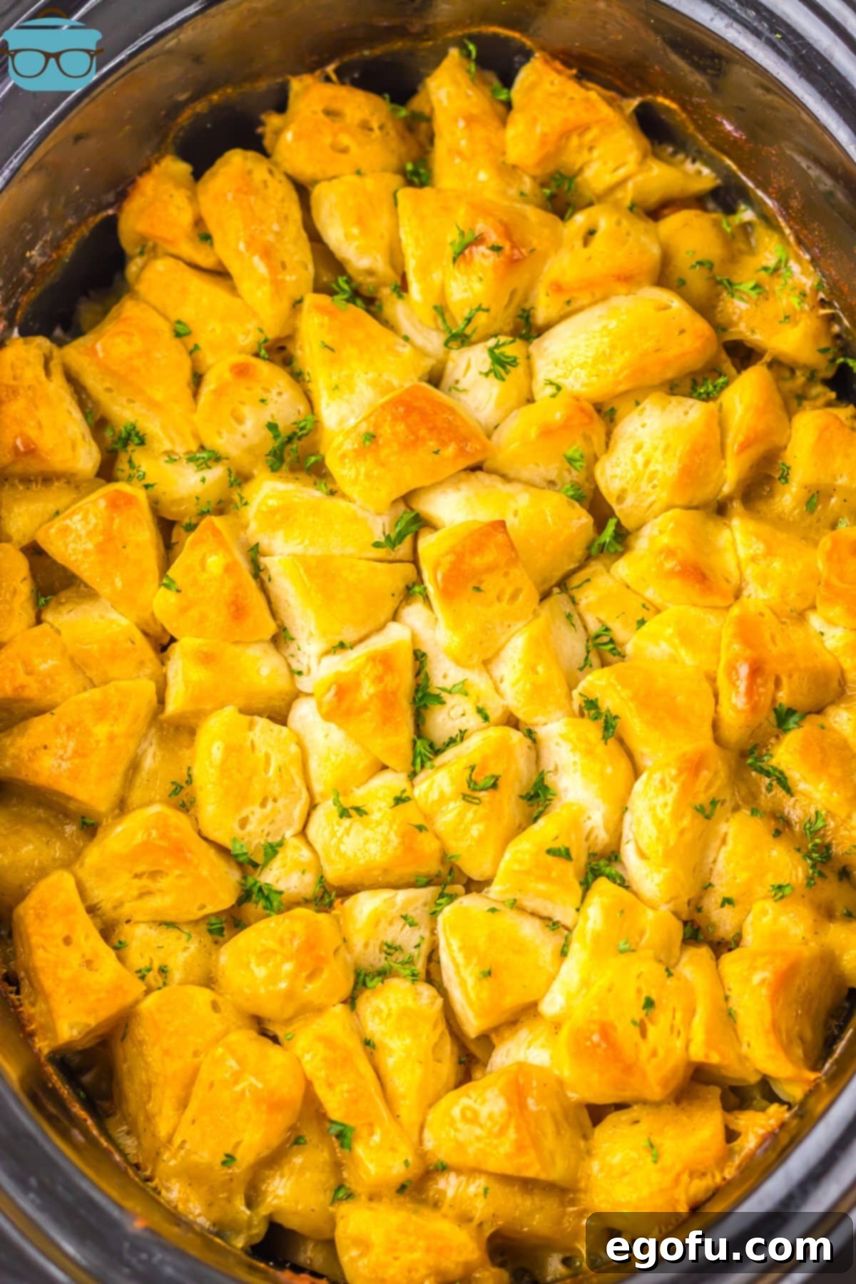 Looking down on a Crock Pot full of chicken pot pie casserole.