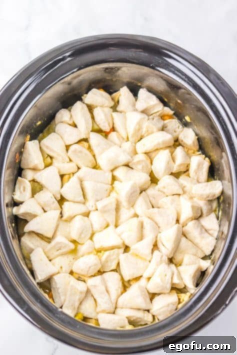 Biscuit pieces on top of a casserole.