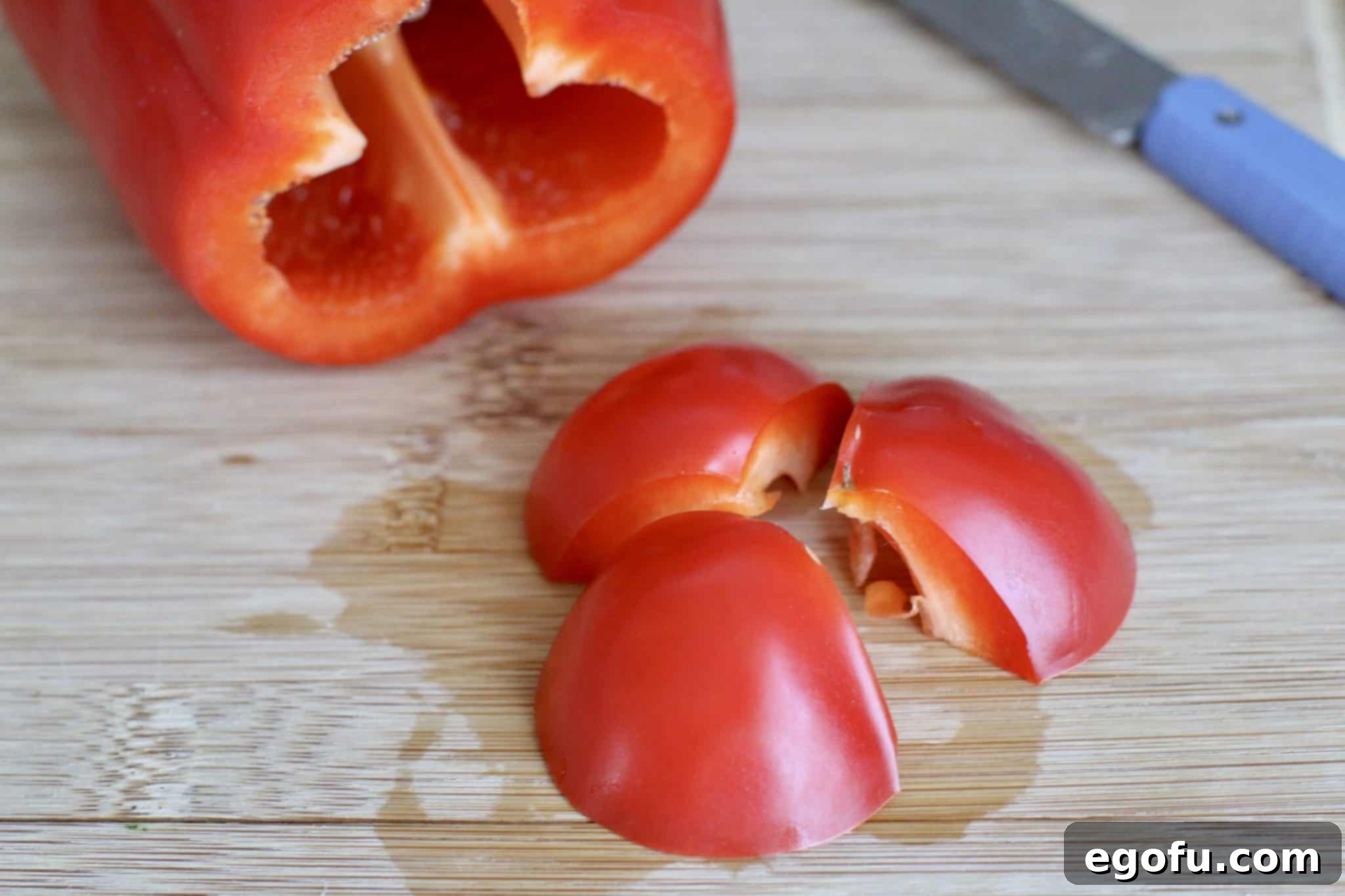 the end of a red pepper sliced into three parts.