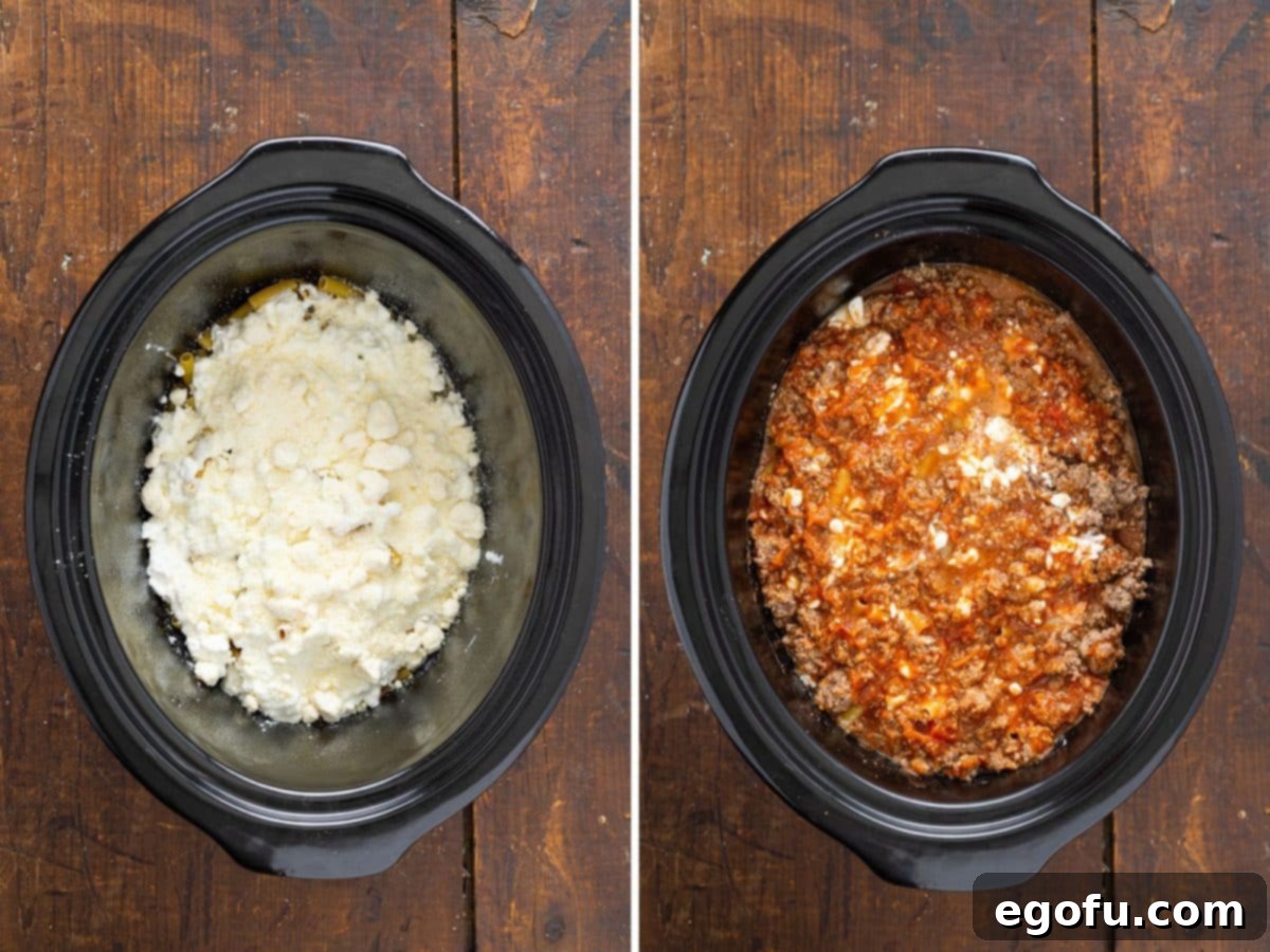 The layered construction of Crock Pot Baked Ziti within the slow cooker, showing meat sauce, pasta, and cottage cheese, ready for the final layer.