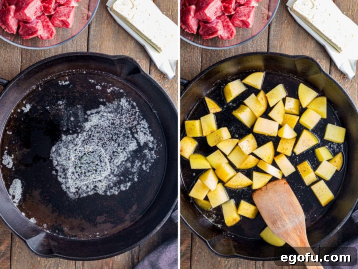 Pan-Seared Garlic Butter Steak Bites with Crispy Potatoes 6 Melted butter and olive oil combining in a skillet with diced potatoes.
