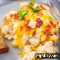 A small pile of Chicken Hash Brown Casserole on a plate.