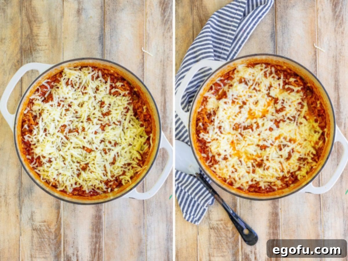 A gloriously melted cheese layer topping the Italian Rice Casserole, promising a warm and gooey delight.