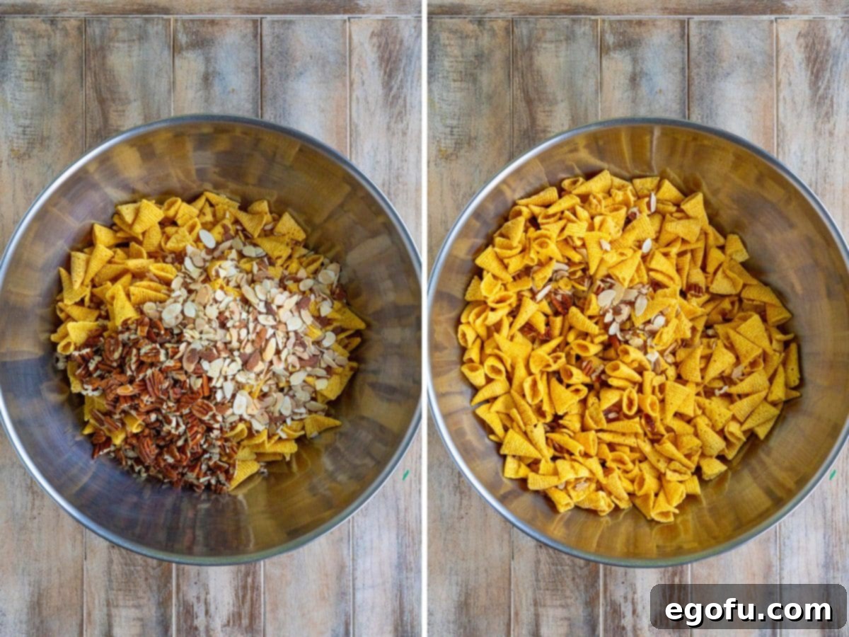 Bugles, almonds, and pecans in a bowl being mixed together, ready for the sweet coating.