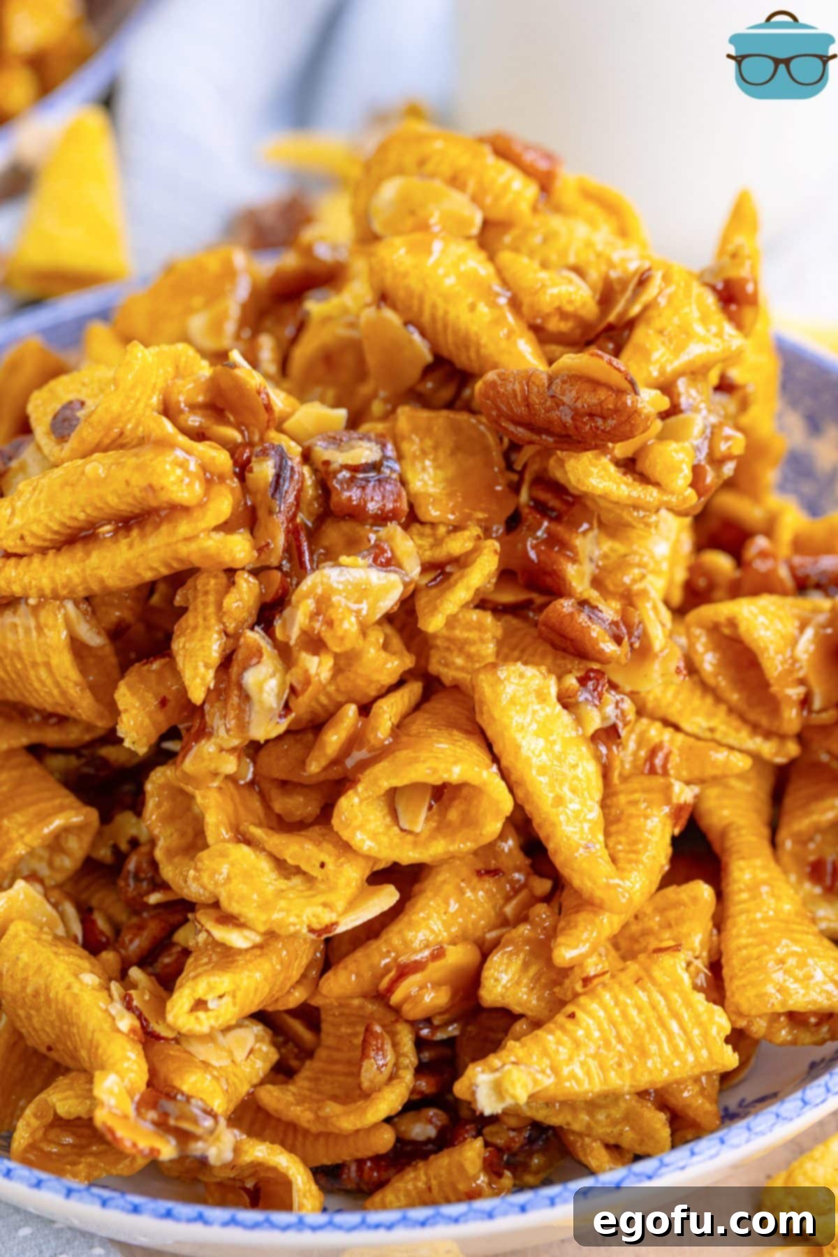 A close-up view of an overflowing, tantalizing pile of Sweet Bugle Party Mix, ready to be devoured.