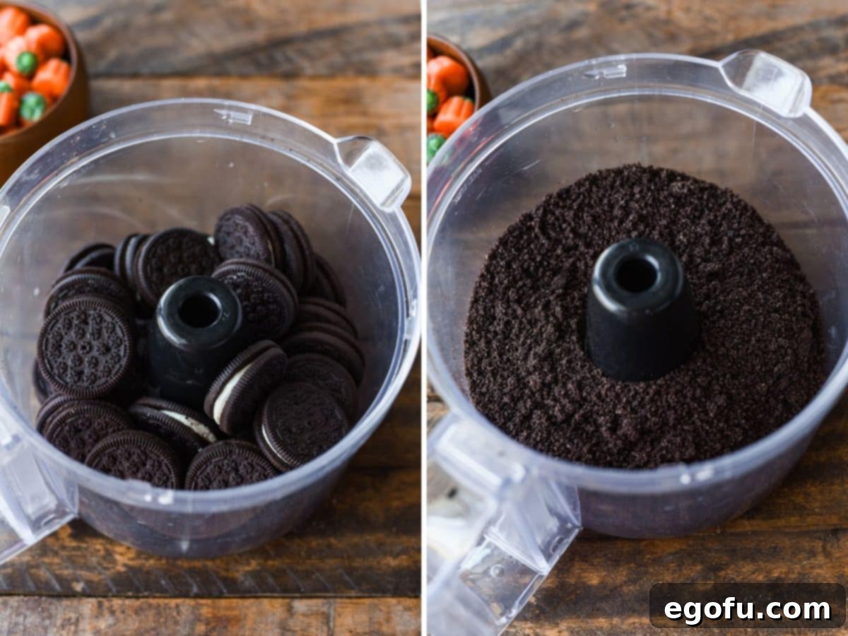 Oreos being crushed into crumbs in a food processor.