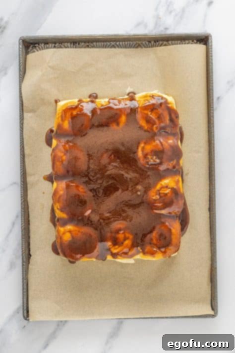 Irresistible King's Hawaiian Cinnamon Buns 12 A cinnamon sugar butter mixture melting into Hawaiian rolls.