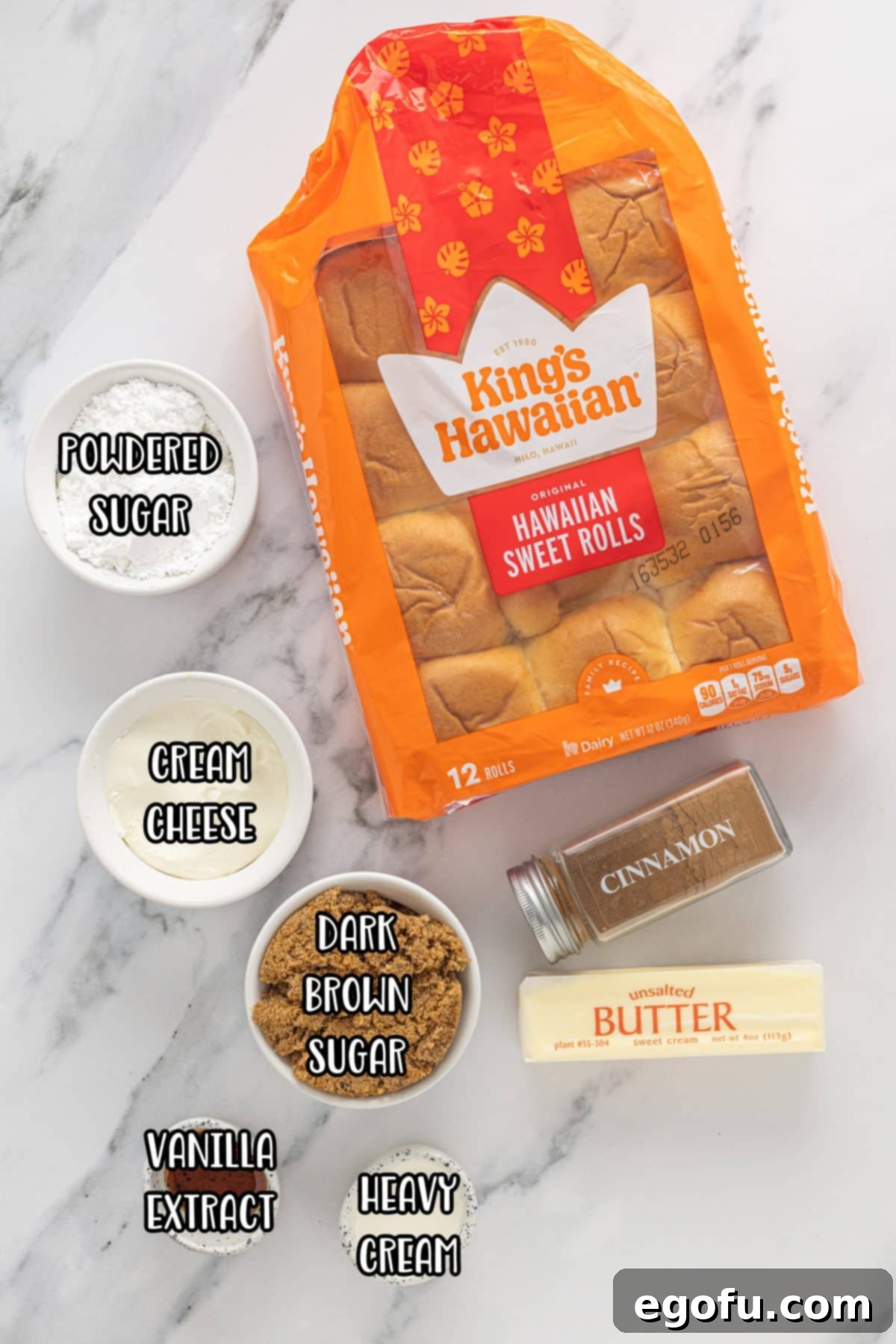 Irresistible King's Hawaiian Cinnamon Buns 4 King's Hawaiian Cinnamon Rolls, powdered sugar, butter, dark brown sugar, cinnamon, cream cheese, and heavy cream.