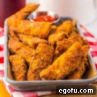 Close up looking at a tray of homemade copycat KFC Potato Wedges.