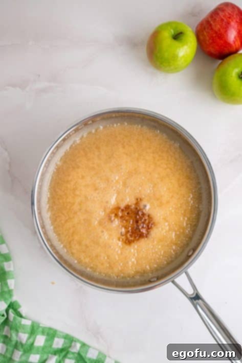 Apple Dapple Icing in a pot being made.