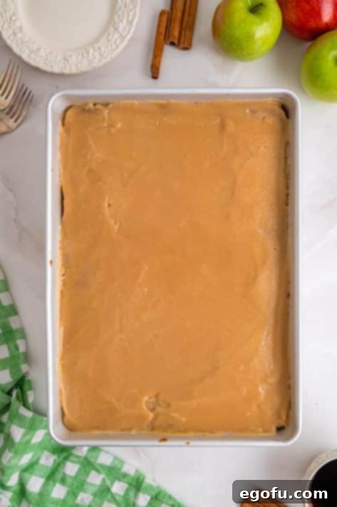 Iced Apple Dapple Cake in a baking dish.