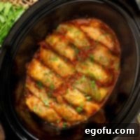Effortless Crock Pot Cabbage Rolls 10 Looking down on a Crock Pot with Cabbage Rolls.