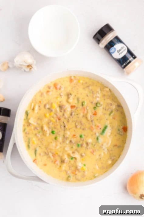 A pot of Ground Beef and Dumplings.