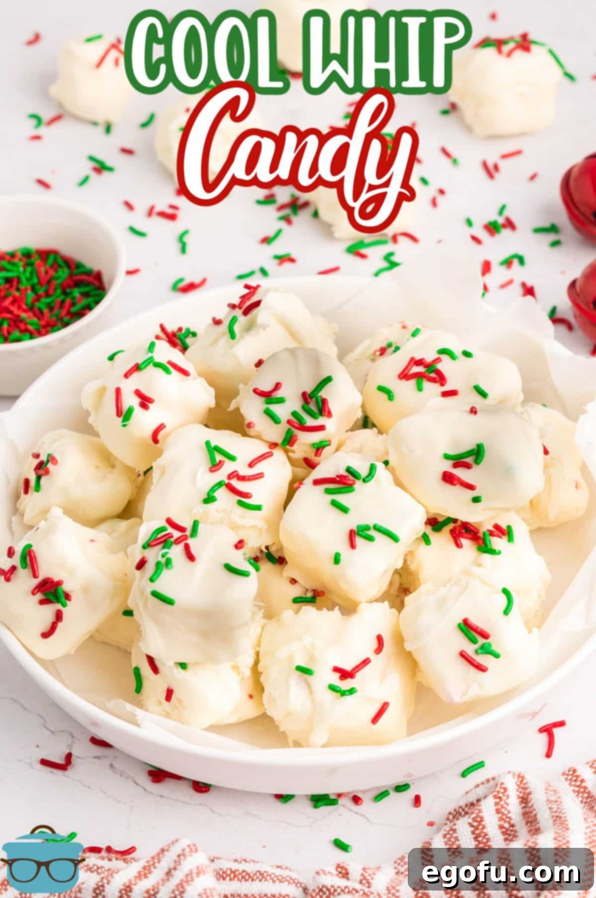 Creamy Cloud Bites 3 A small, elegant serving bowl filled with festive Cool Whip Candy pieces, adorned with colorful sprinkles, highlighting its appeal for special occasions.