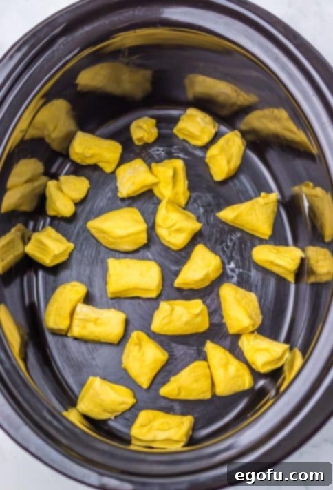 Biscuit dough pieces in a Slow Cooker.