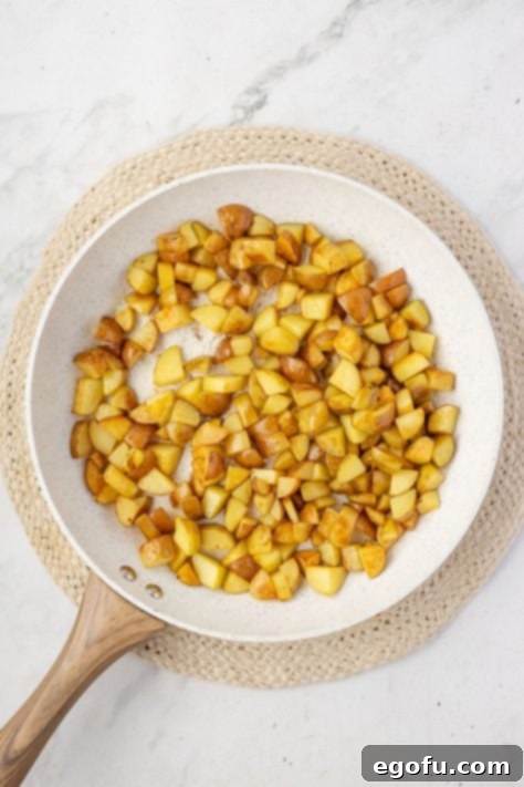 diced potatoes in a skillet.