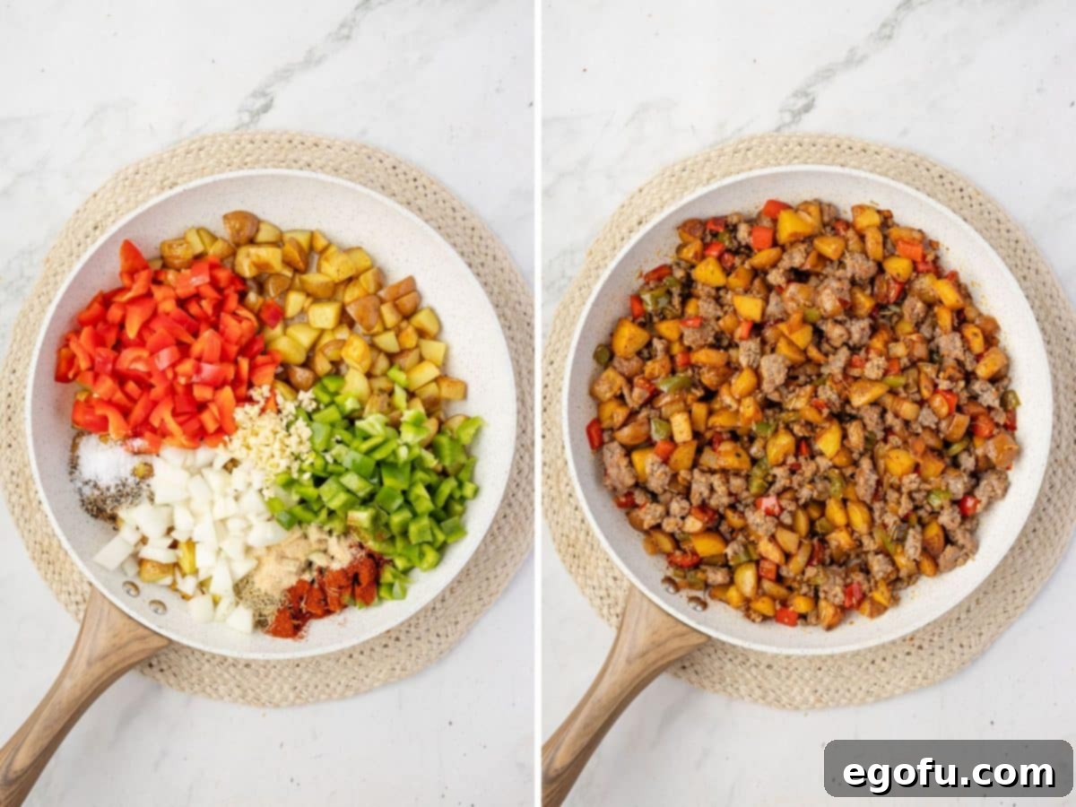 Peppers and onions being added to a sausage and potato mixture in a skillet.