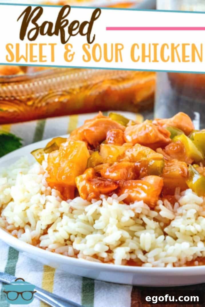 Sticky Sweet-Sour Chicken Bake 3 Baked Sweet and Sour Chicken served over white rice with the baking dish in the background, highlighting the tender chicken pieces and colorful vegetables.