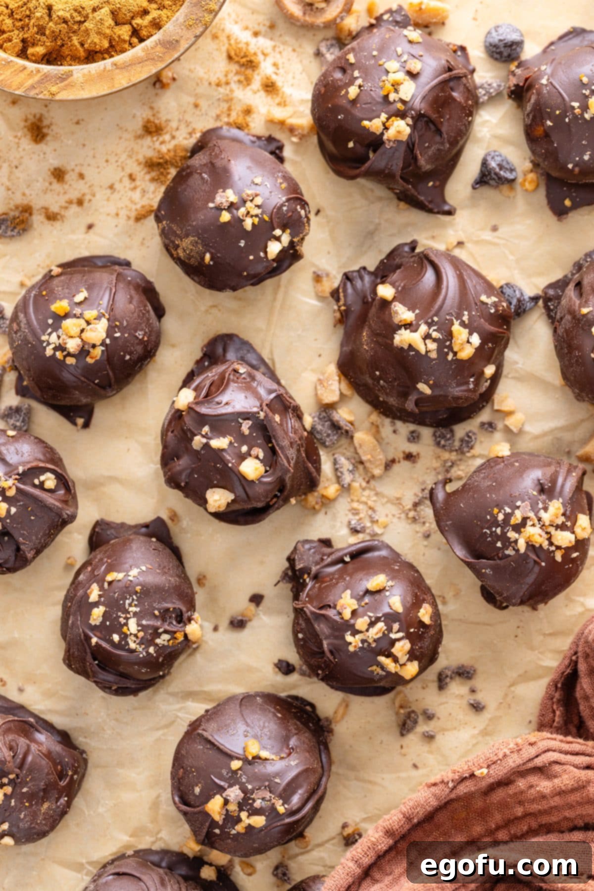 Looking down on a tray of Pumpkin Truffles with graham cracker crumbs on top, ready to be enjoyed.