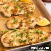 Garlic Parmesan Crusted Chicken 8 Baked Garlic Parmesan Chicken in a baking sheet.