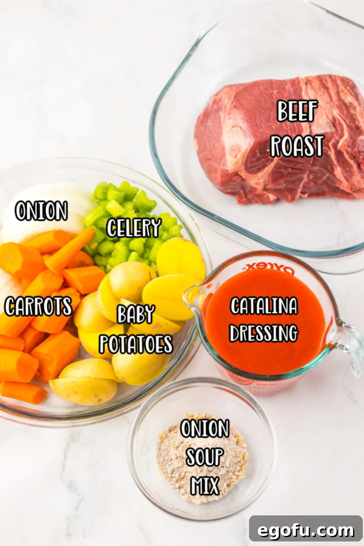 Chuck roast, Catalina dressing, onion, celery, baby potatoes, carrots, and onion soup mix. 