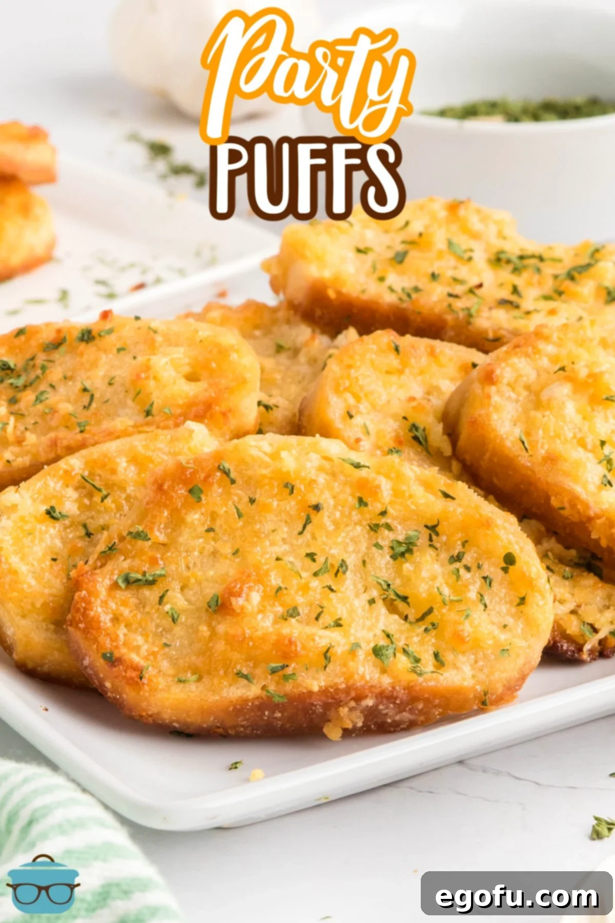 A white serving plate full of Party Puffs.