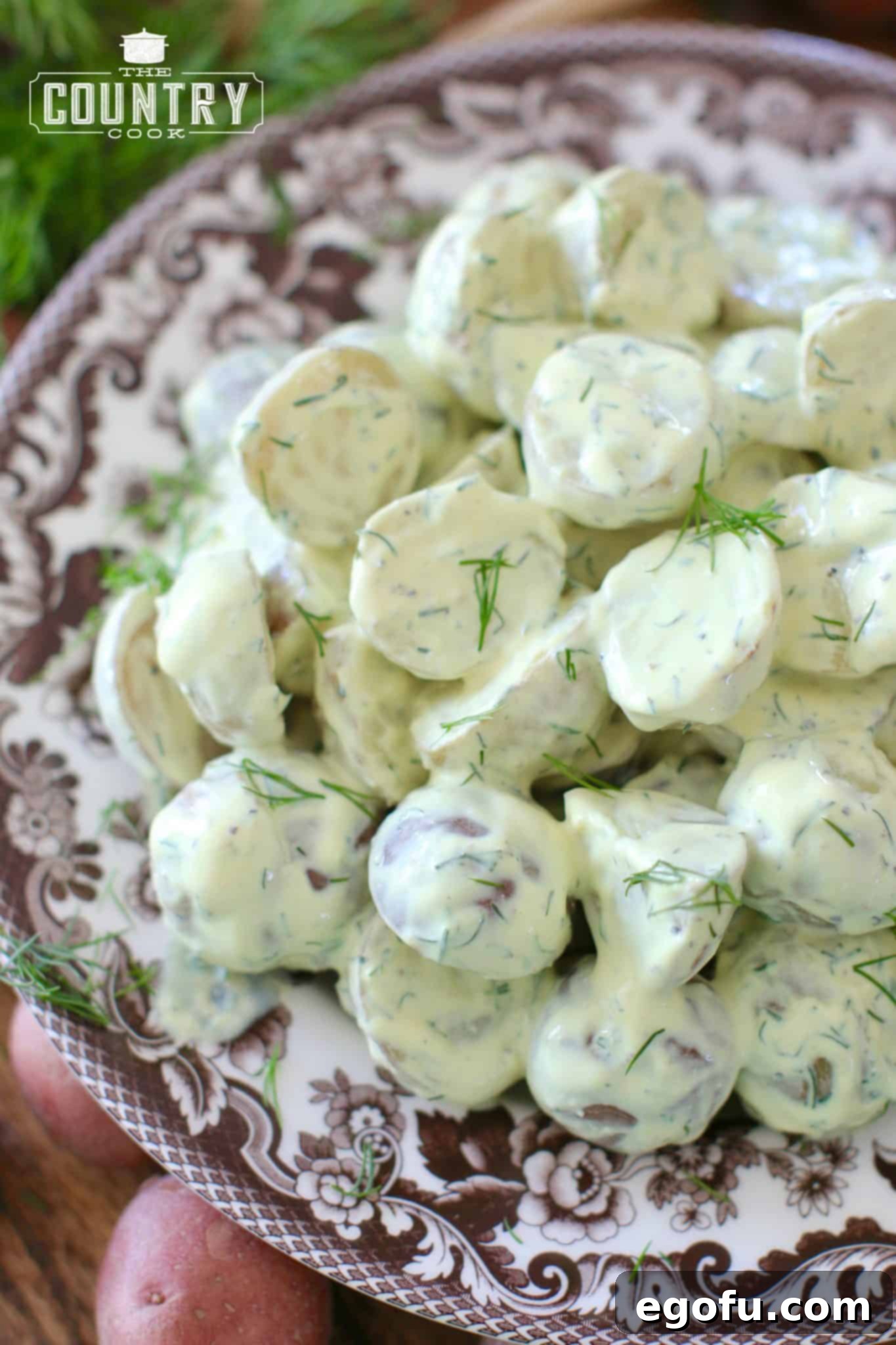 Freshly made Greek Yogurt Dill Potato Salad in a serving bowl