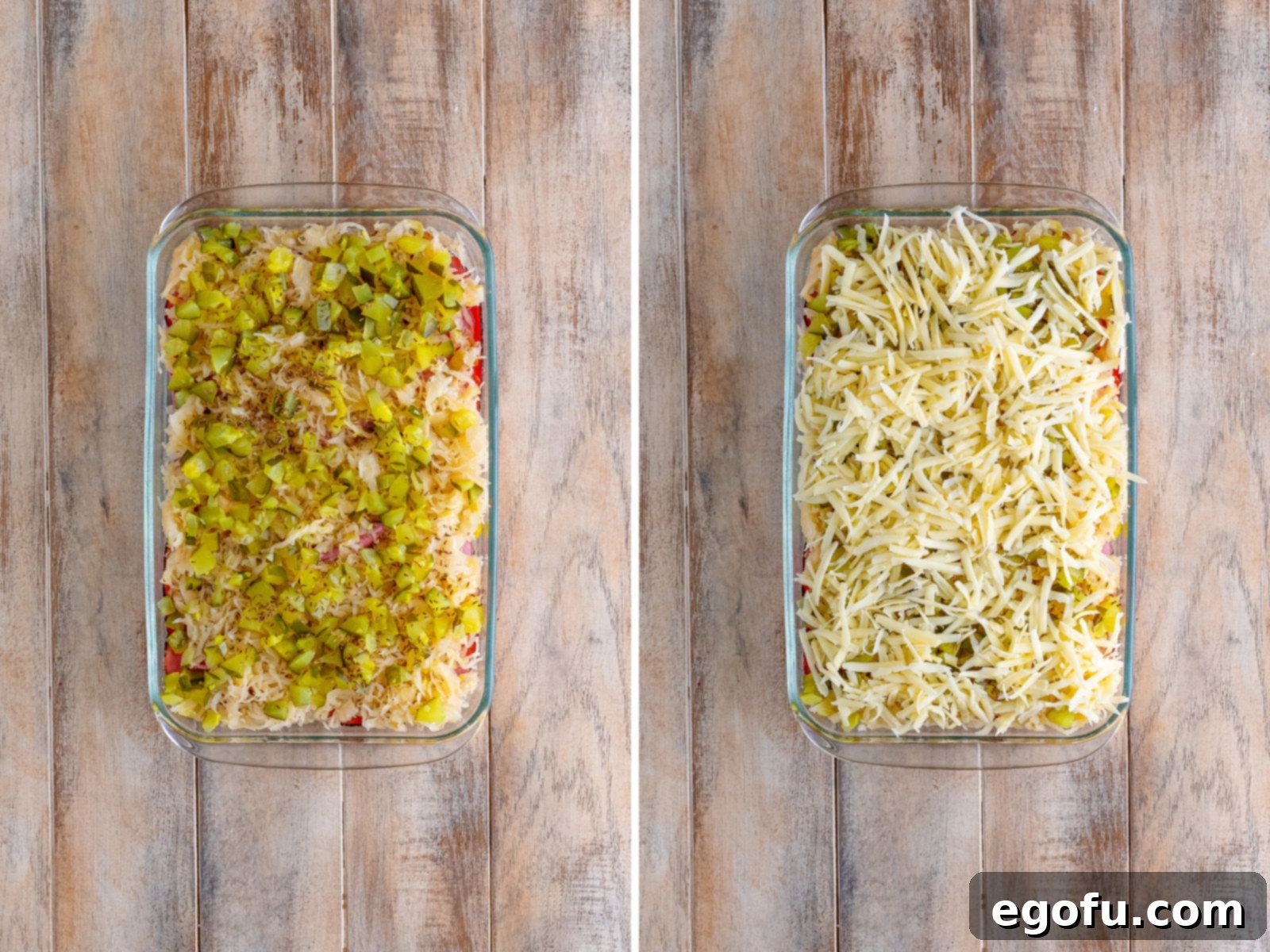 A casserole dish layered with cubed bread, meat, sauerkraut, chopped pickles, shredded cheese, and seeds.s.