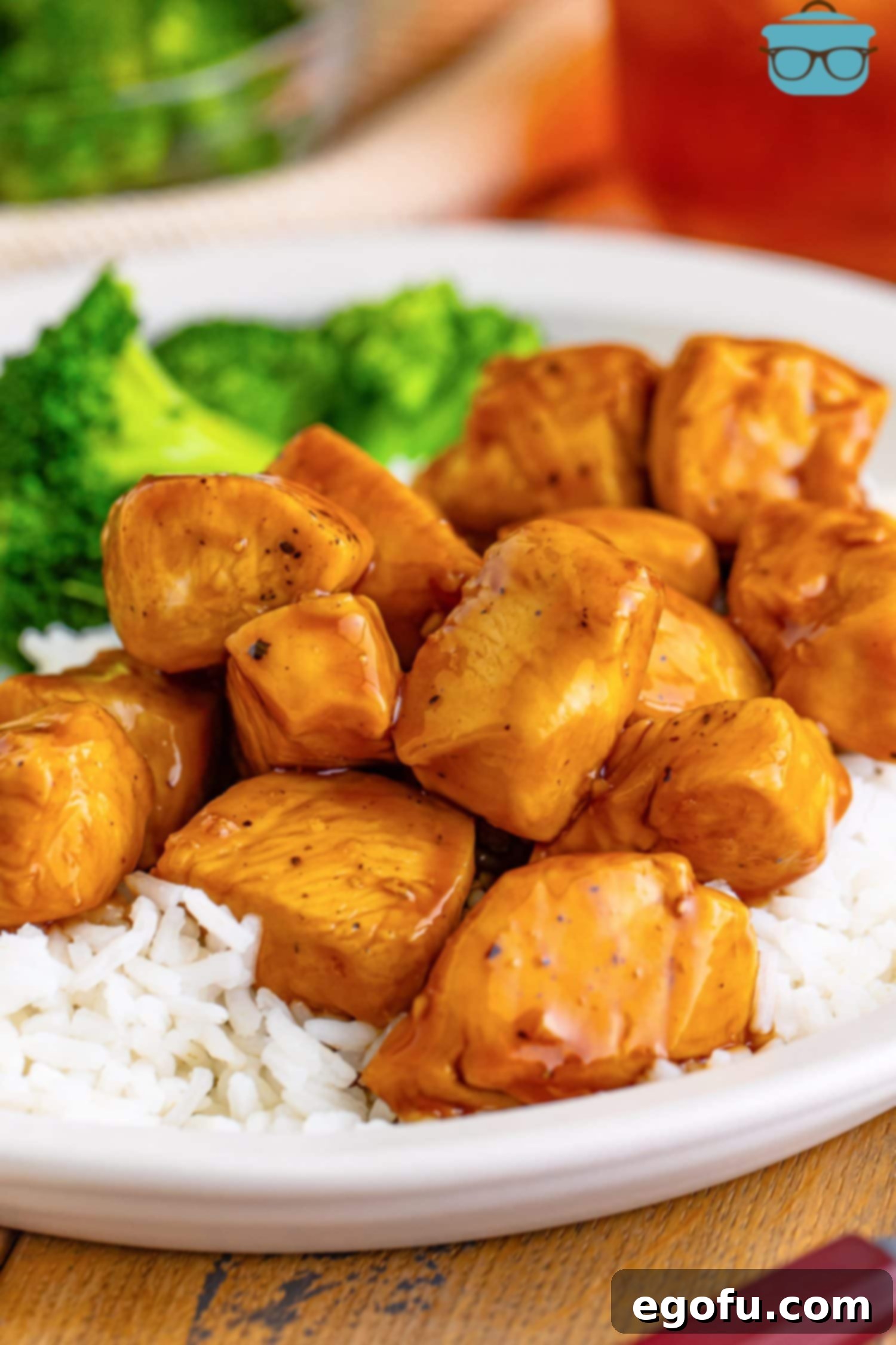 Effortless Teriyaki Glazed Chicken 2 A plate with rice and Teriyaki Chicken with broccoli.