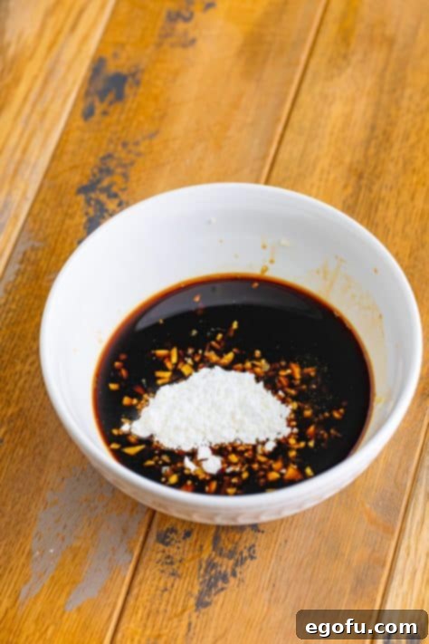 Effortless Teriyaki Glazed Chicken 11 A bowl with brown sugar, soy sauce, ginger, garlic, vinegar and cornstarch.