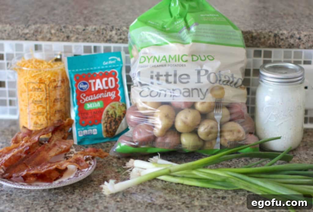 little potatoes, taco seasoning, ranch dressing, shredded cheddar cheese, cooked bacon and green onions.