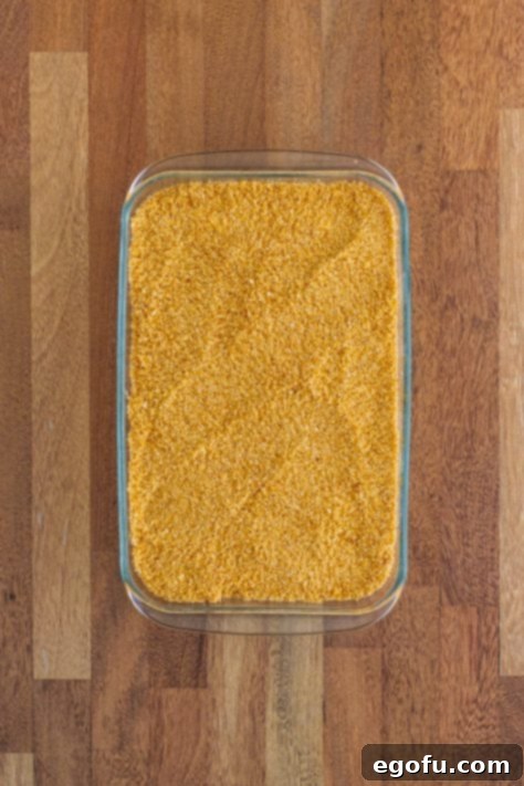 bread crumbs spread evenly over casserole.