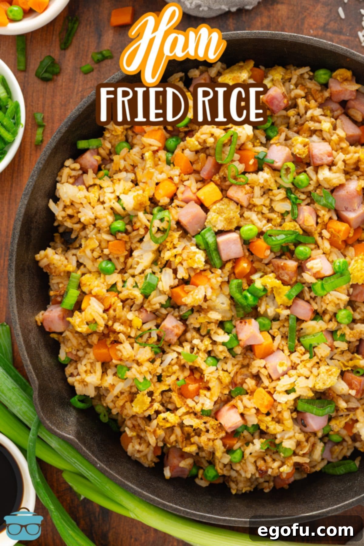 Golden Ham Fried Rice 4 A large skillet of Ham Fried Rice, hot and steaming, ready to be served.