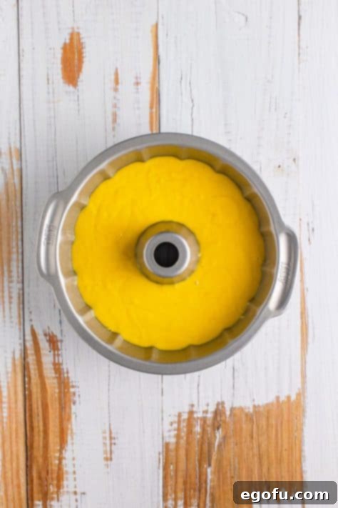 Shirley Temple Cake batter in a bundt pan.