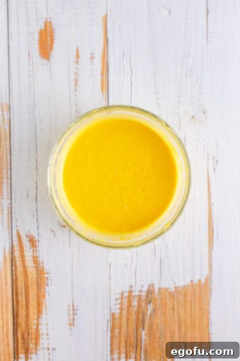 Cake batter in a mixing bowl.