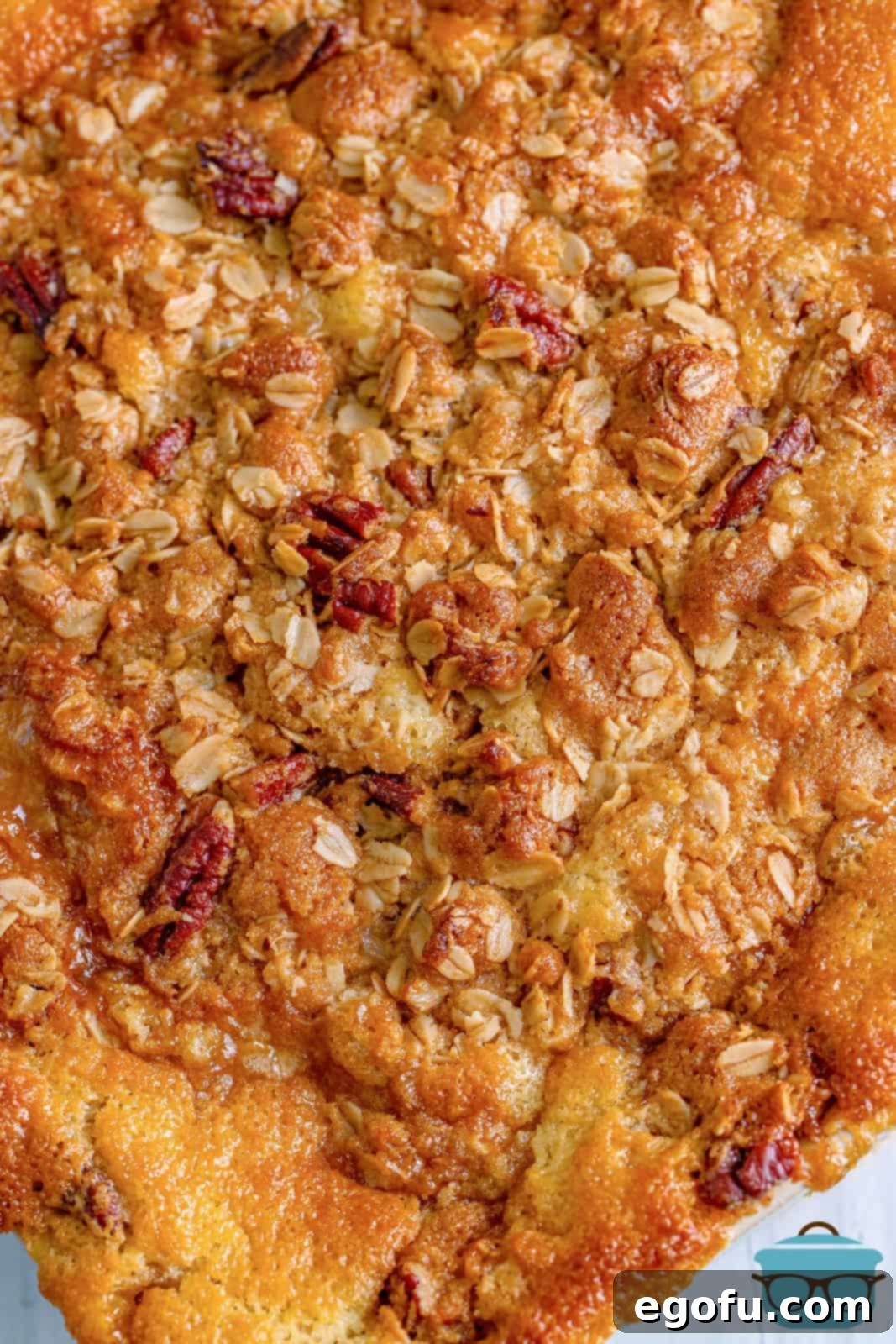 A freshly baked Southern Banana Cobbler, golden brown and bubbling, just out of the oven, radiating warmth and delicious aroma.