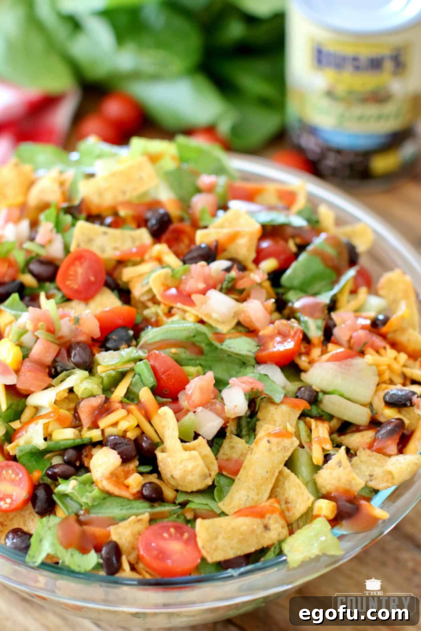Frito Fiesta Taco Salad 5 Large glass Bowl of Frito Taco Salad with fresh Pico de Gallo on top, ready to be served.