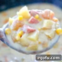 Potatoes, ham, corn and carrots in chowder