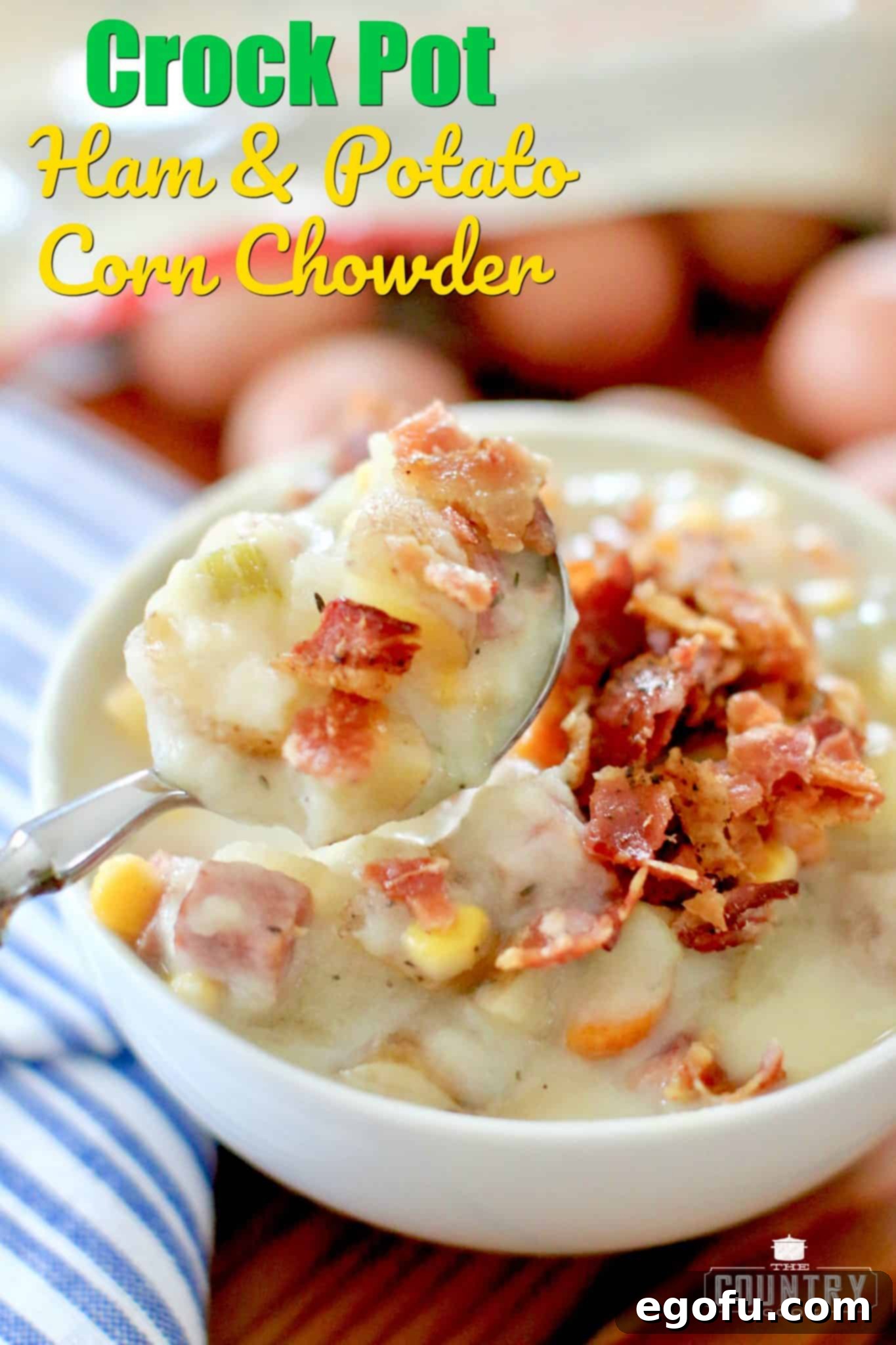 Crock Pot Ham and Potato Corn Chowder recipe from The Country Cook. A silver spoon holding up a serving of chowder.