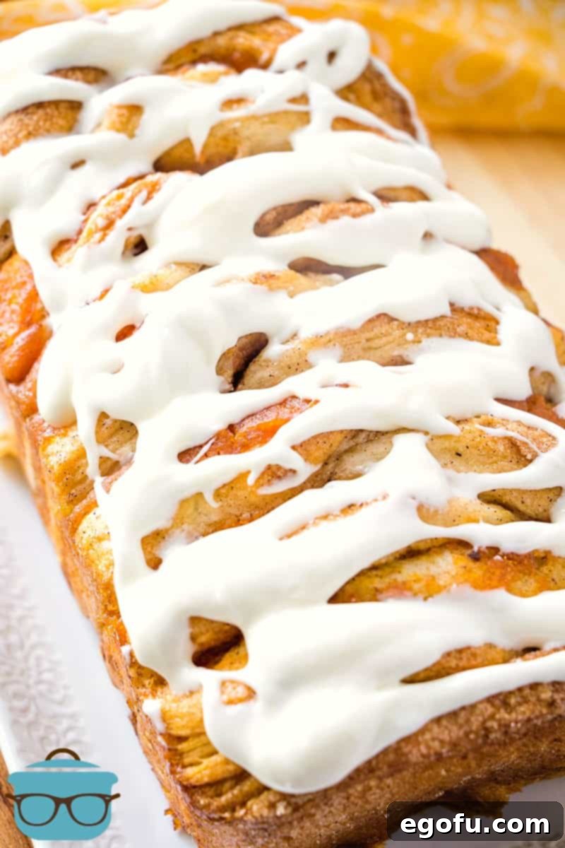 Easy Pumpkin Pull-Apart Bread with Cream Cheese Icing - a simple yet impressive fall dessert recipe